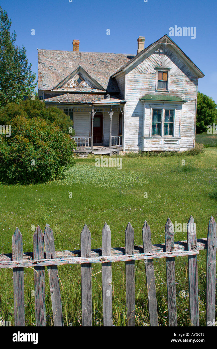 Old Americana wooden house with a large grass lawn Paris Idaho USA Stock Photo