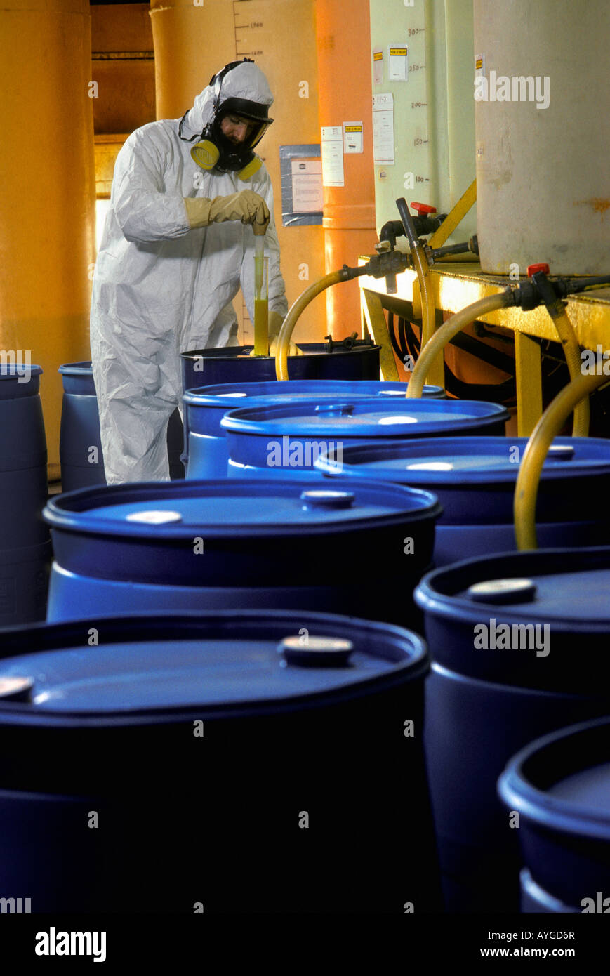 Workman wearing hazardous material protection Stock Photo Alamy