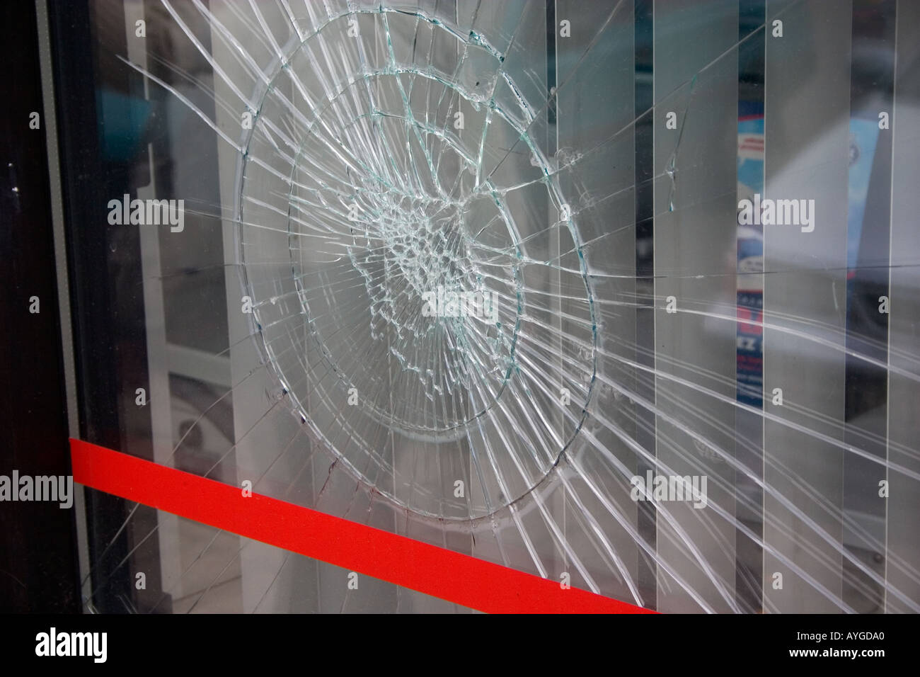 Cracked window at a shop in Poland. Rawa Mazowiecka Poland Stock Photo
