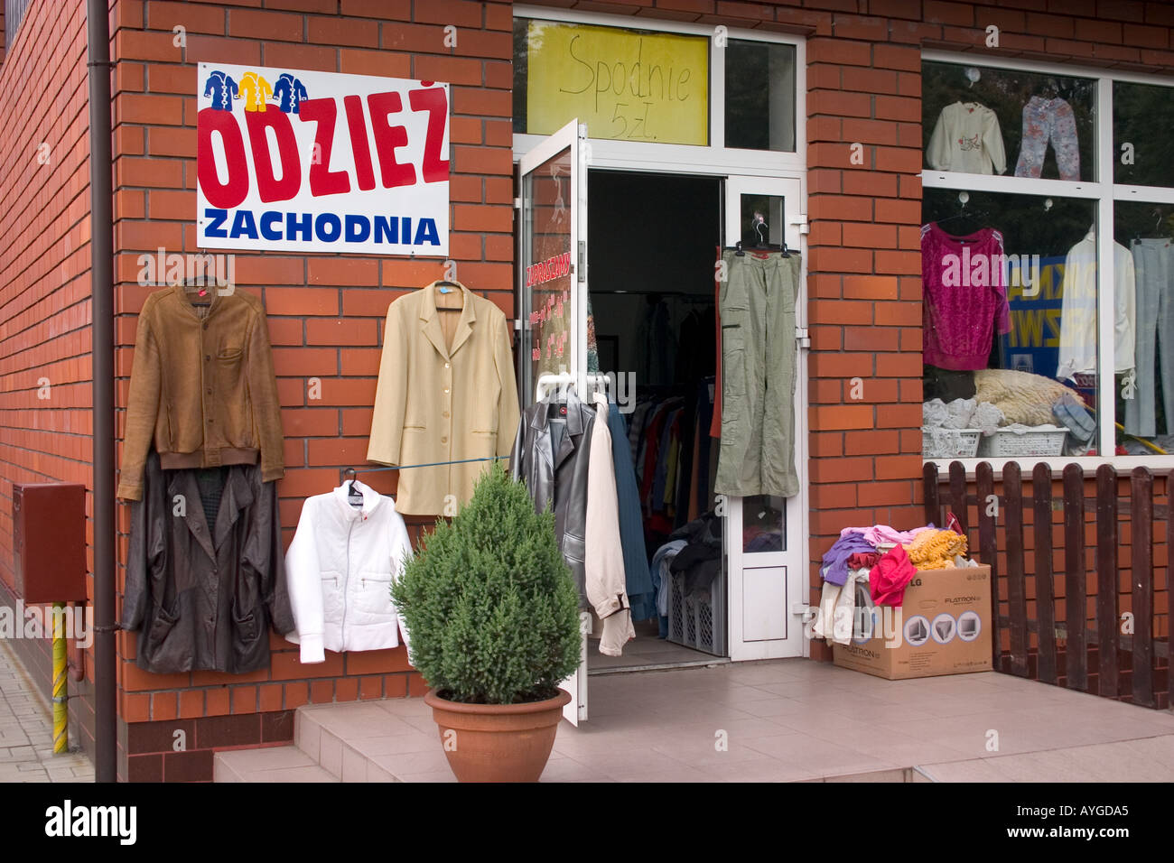 Clothing displayed outside of shop. Rawa Mazowiecka Poland Stock Photo