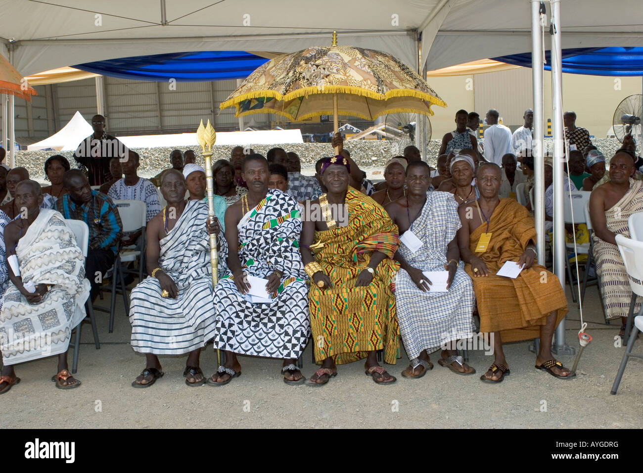 Ashanti Chief, linguist with staff, elders and retinue seated and assembled for a celebration, Western Ghana Stock Photo