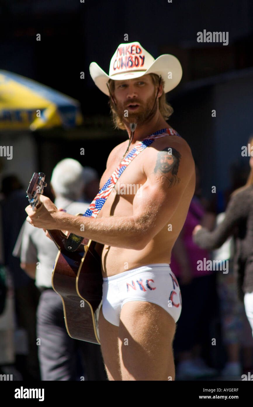 Naked Cowboy Plays his Guitar in His White Cotton Briefs in Times Square  for Tourists Manhattan New York City NY USA Stock Photo - Alamy