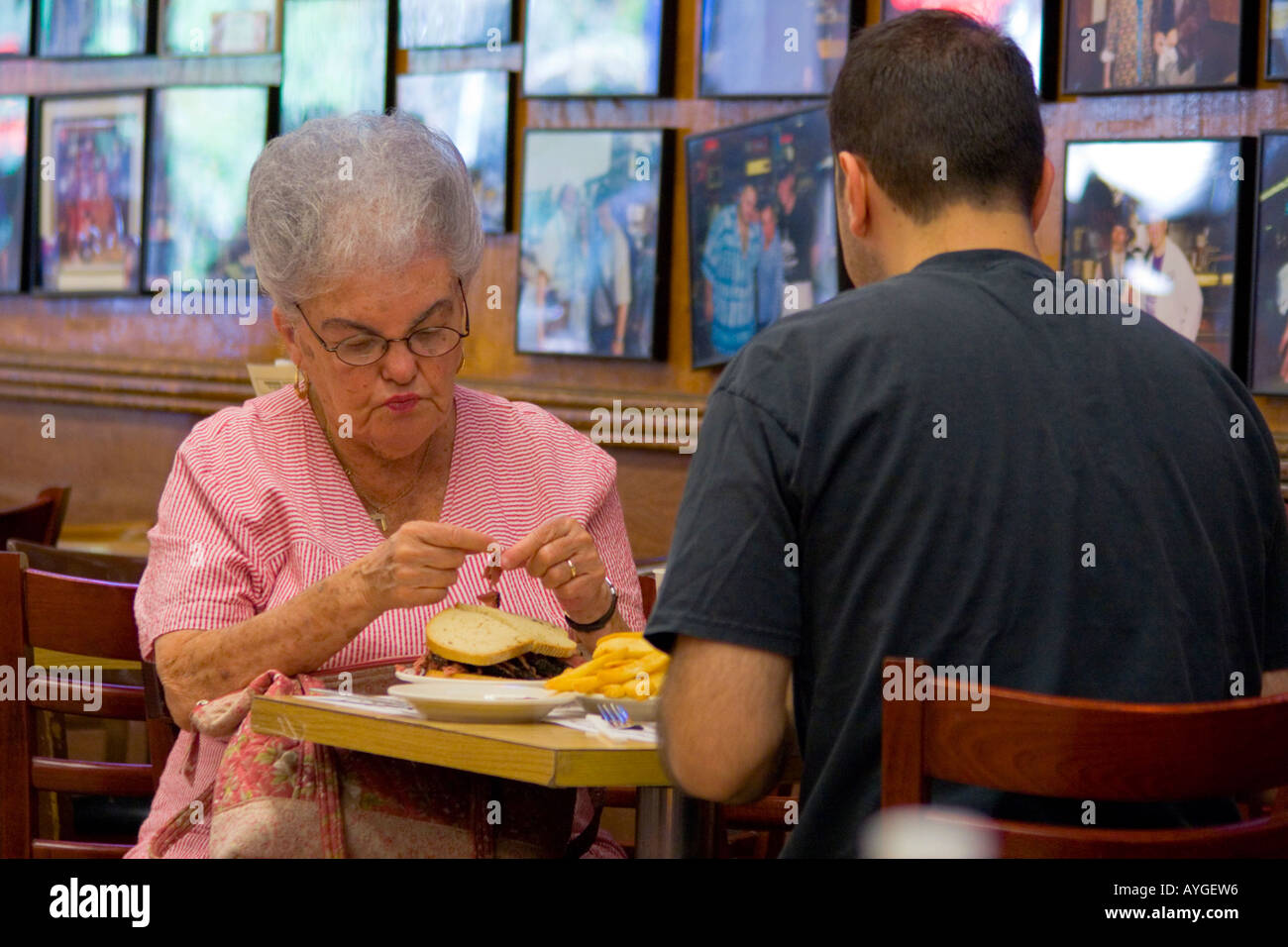 Customers enjoying a sandwich inside the famous Katz delicatessen New