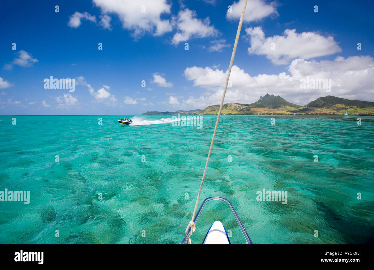 Thrills v Sedate? A fast motor-boat passes a more leisurely catamaran. Stock Photo