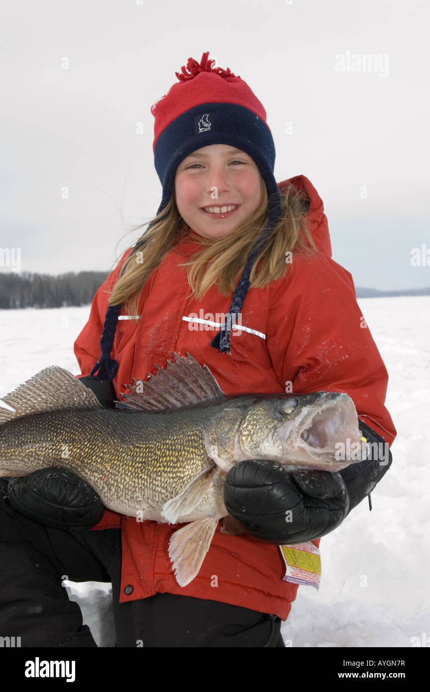 GIRL ICE FISHING BIG WALLEYE NORTHERN ONTARIO Stock Photo - Alamy