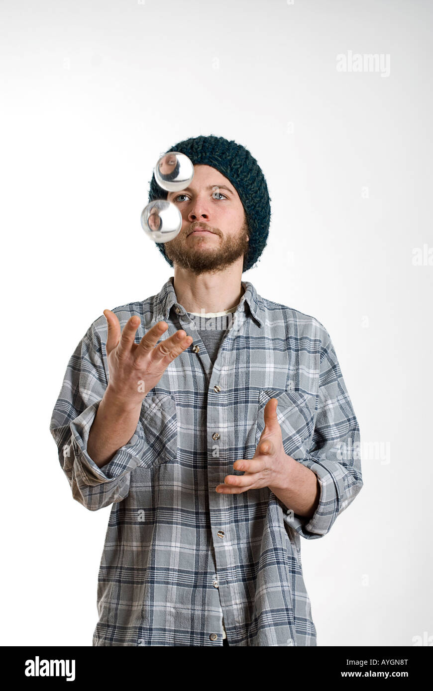 Young man juggling glass balls Stock Photo Alamy