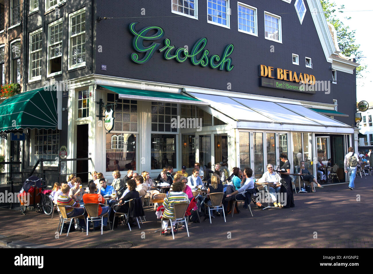Pavement cafe and bar with Grolsch beer Amsterdam The Netherlands Stock