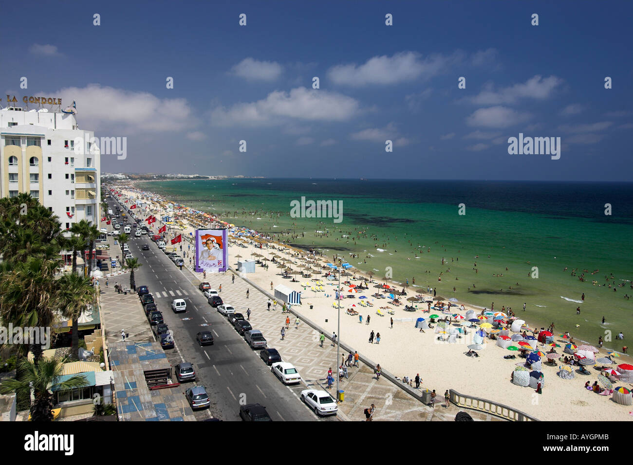 Popular Boujaffar Beach and promenade at Sousse Tunisia wiith one of the ubiquitous banner images of President Ben Ali Stock Photo