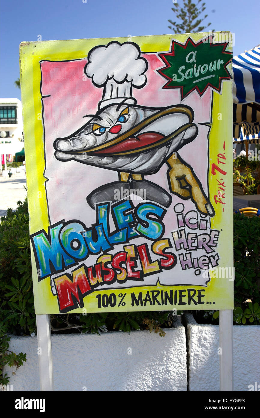 Mussels for sale cartoon sign Kantaoui Marina Tunisia Stock Photo