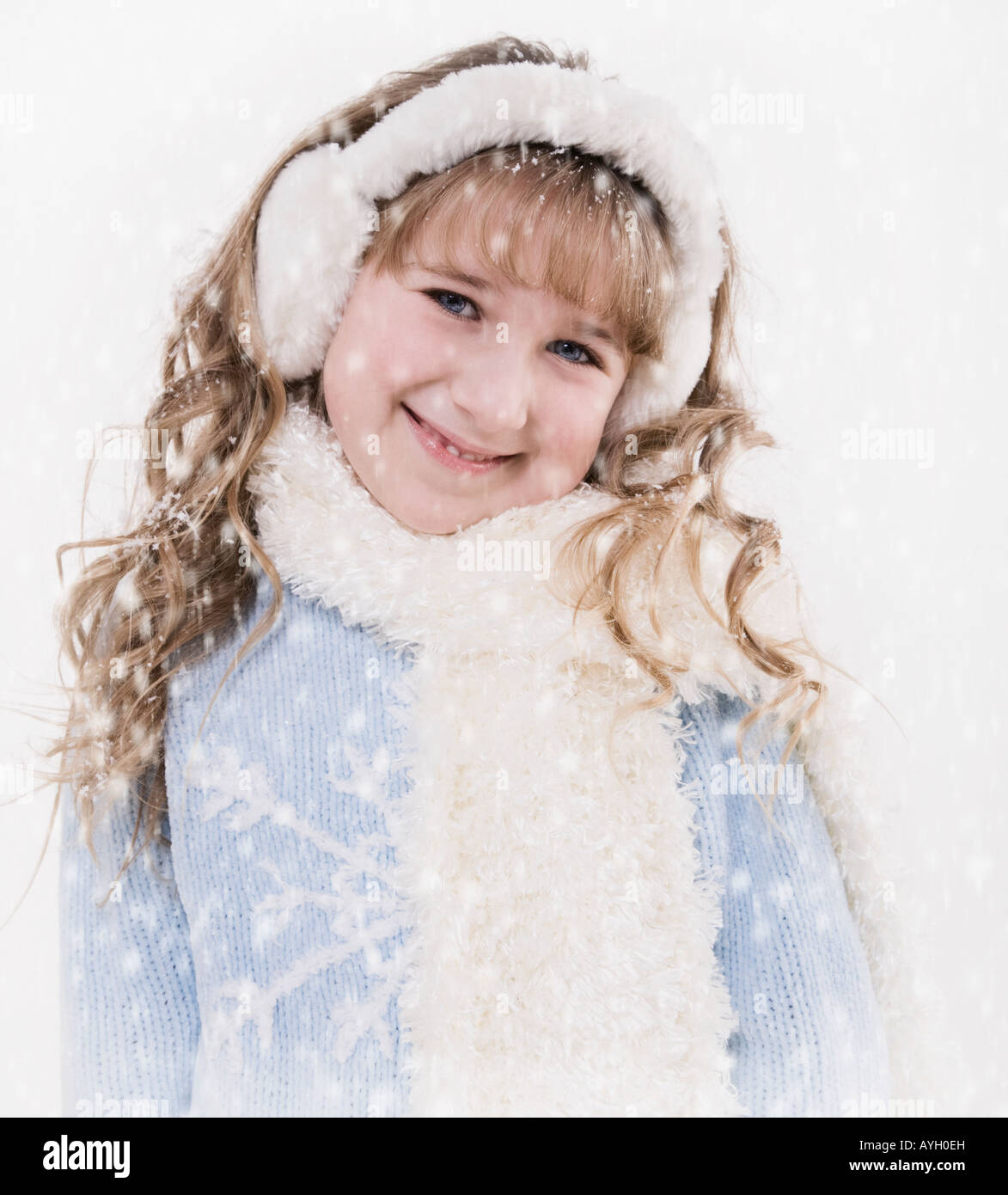 Girl wearing winter clothes in snow Stock Photo Alamy