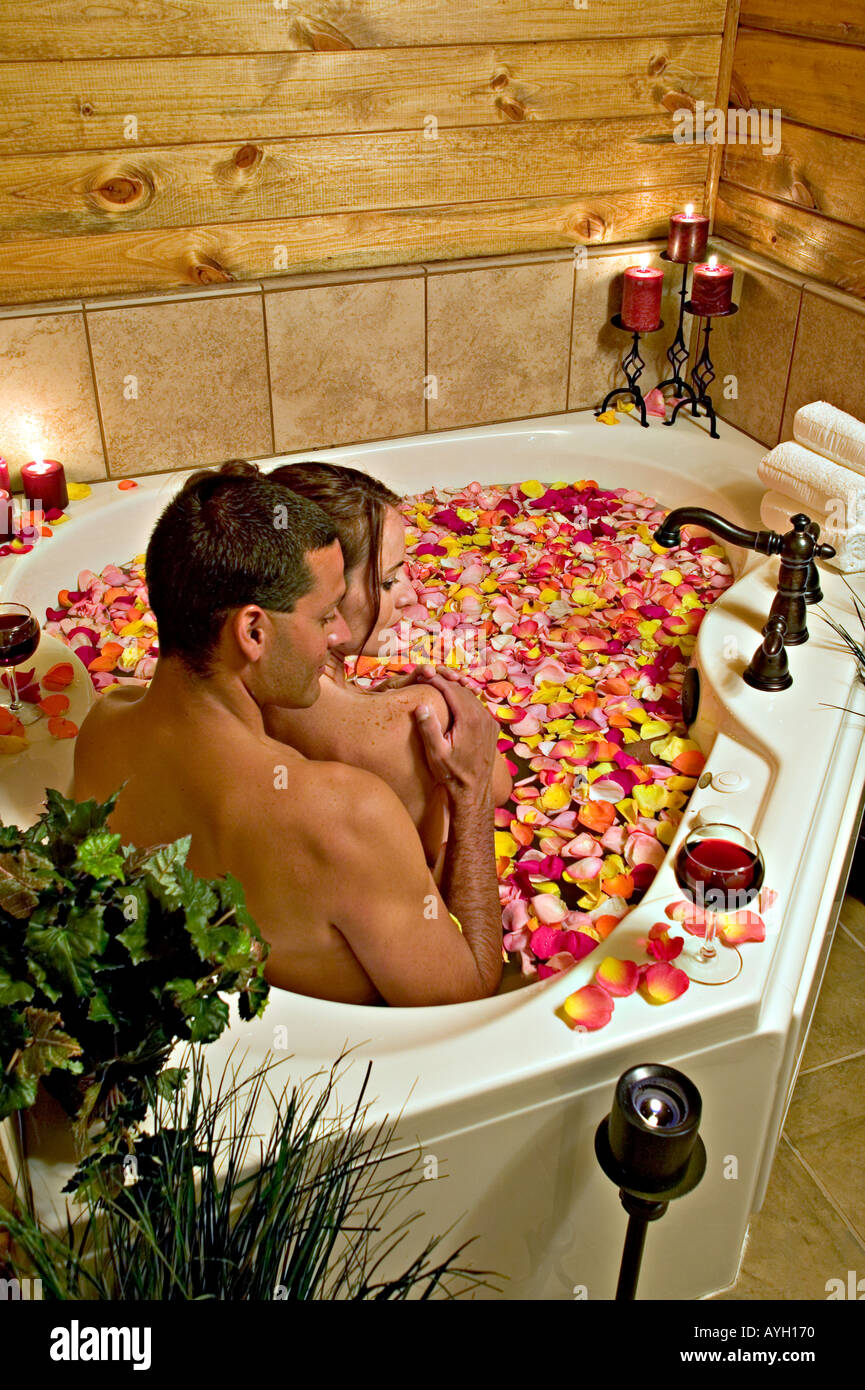Couple relaxing in a bath Stock Photo