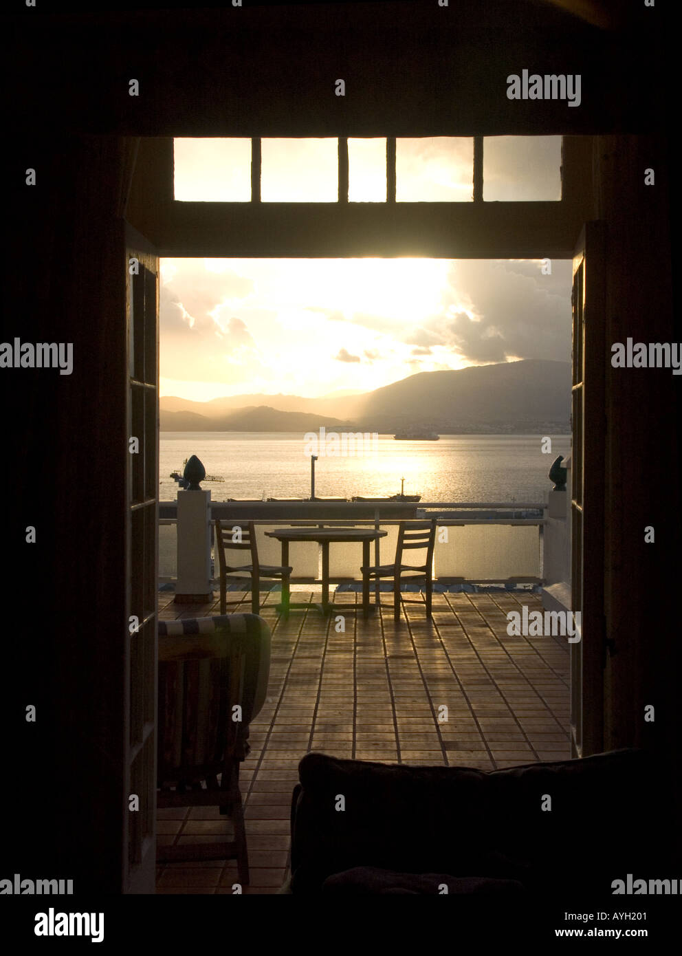 Dusk over the Bay of Gibraltar through hotel patio doors Stock Photo