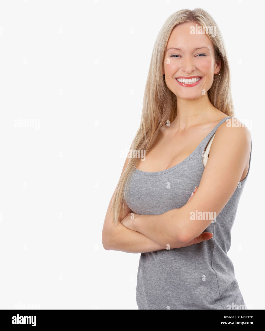 Woman with arms crossed Stock Photo - Alamy