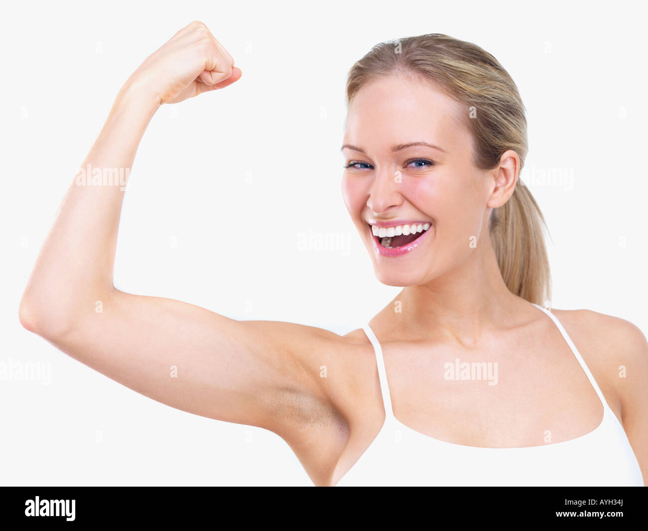 Woman Flexing Biceps Stock Photo Alamy