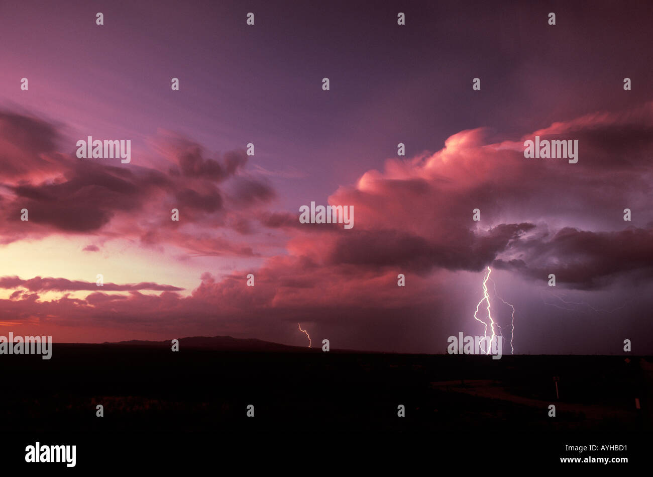 Close striking lightning bolts during summer monsoon in Southwestern Arizona United States Stock Photo