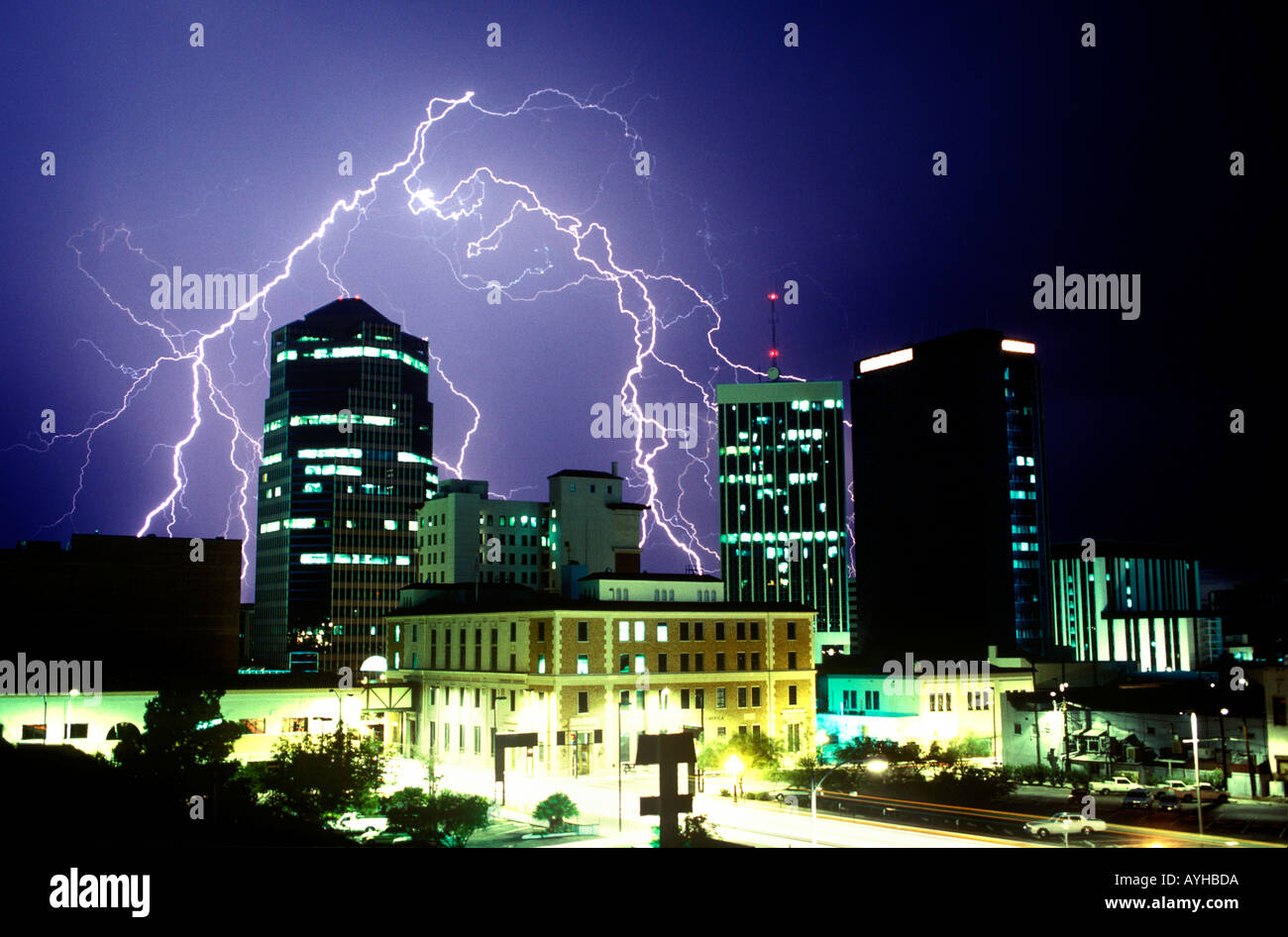 Lightning striking in the city of Tucson Arizona United States during summer monsoon storm Stock Photo