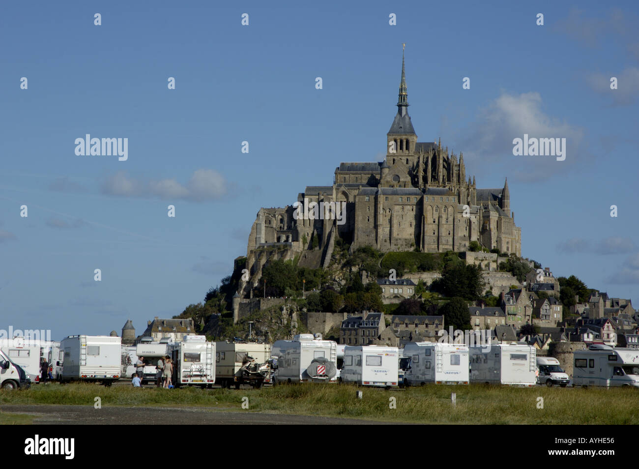 Campervans parked beneath Mont Saint-Michel, Normandy, France. Stock Photo