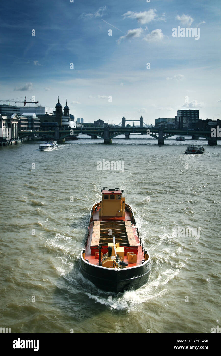 cargo barge on the river thames Stock Photo