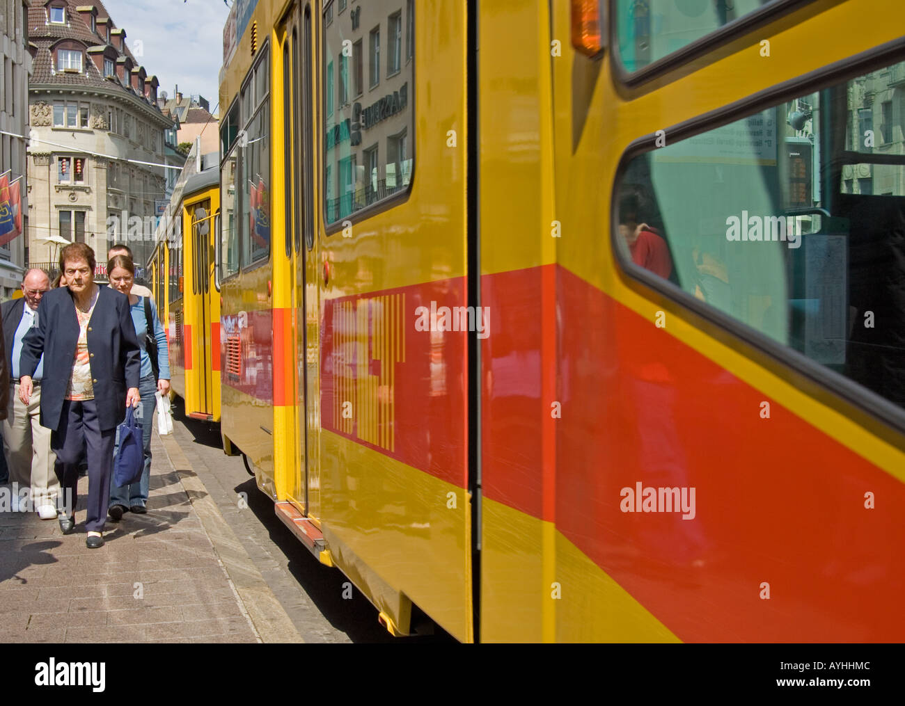 Basel (Basle), Switzerland. People walking by stationary tram Stock ...