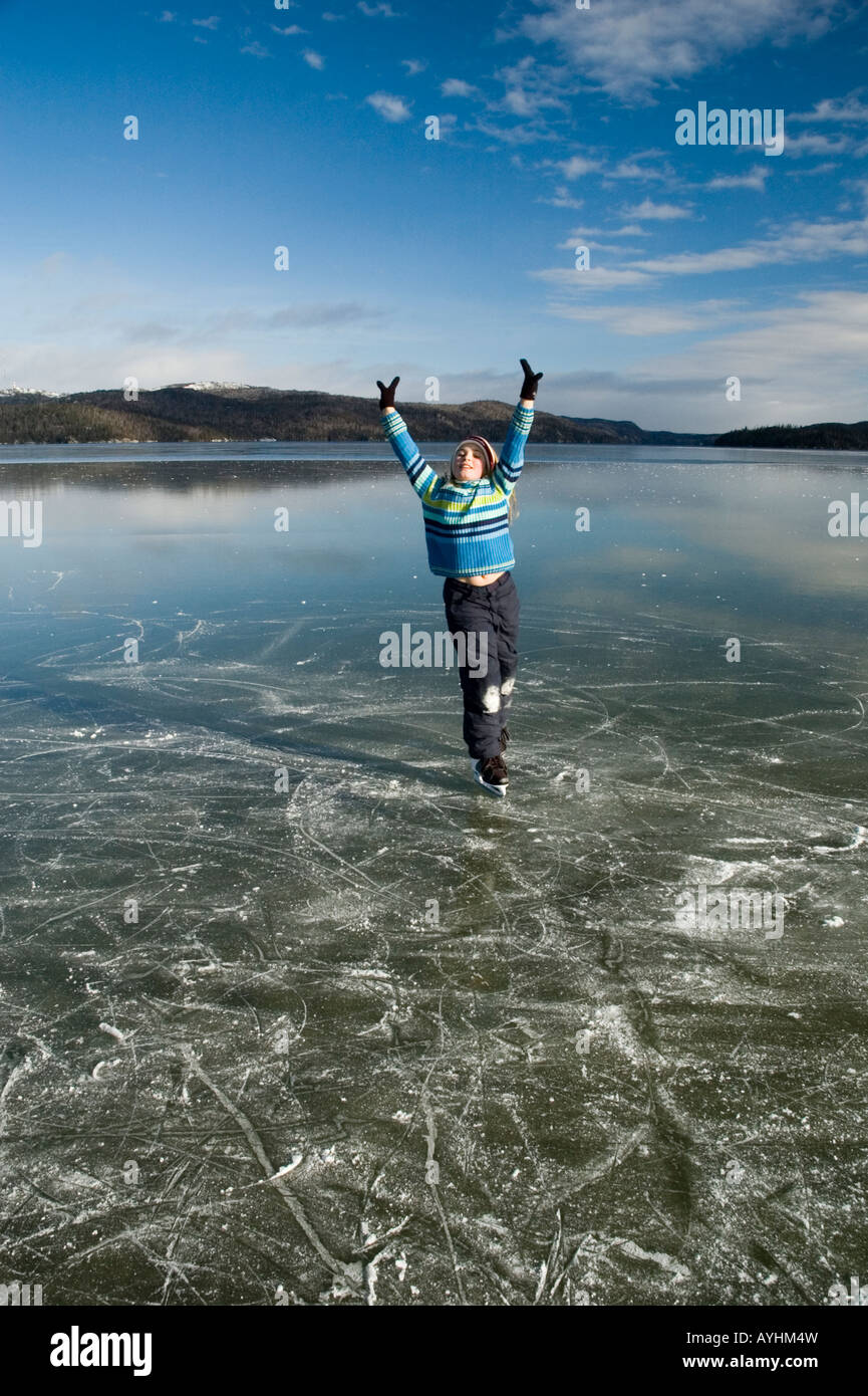 girl skating on frozen lake Stock Photo - Alamy