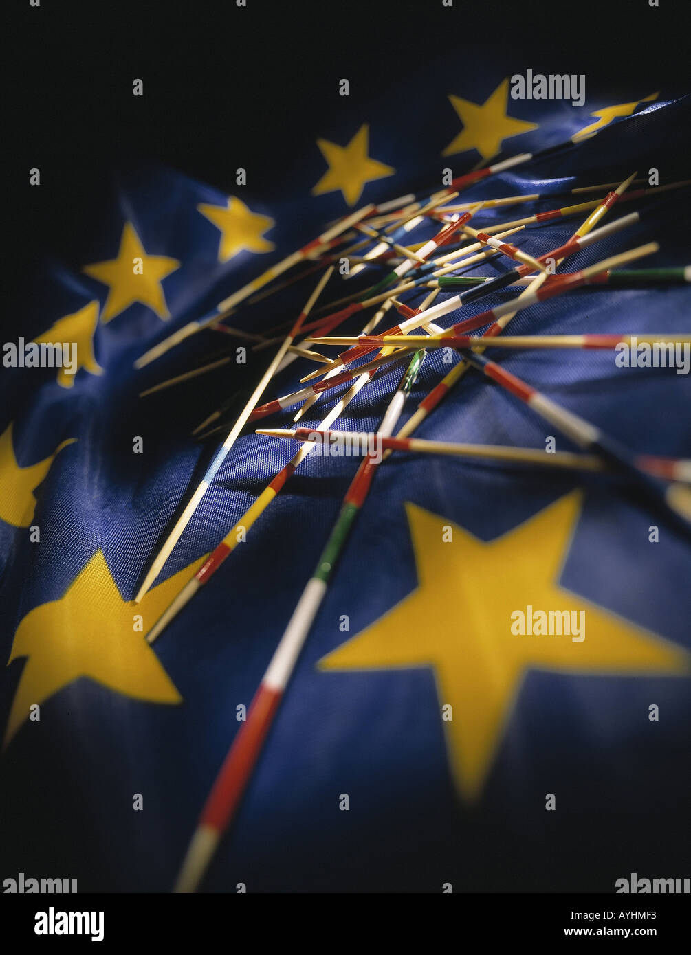 Mikadostaebchen auf Europa Flagge Stock Photo