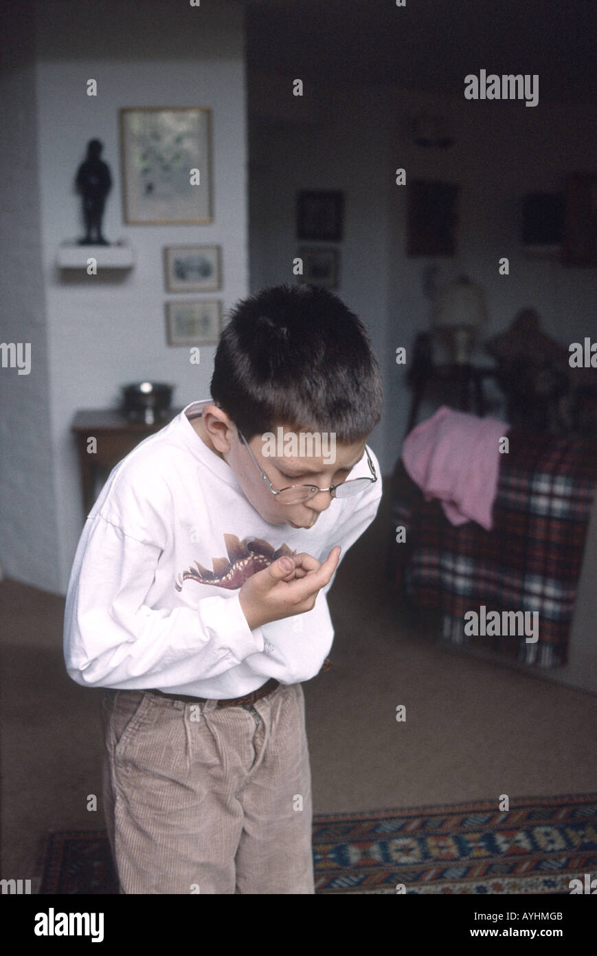 young boy choking on a candy Stock Photo Alamy