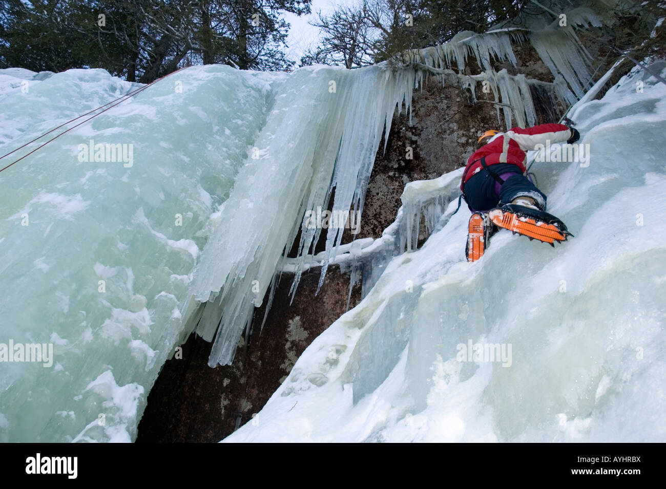 Young girl ice climbing Stock Photo Alamy