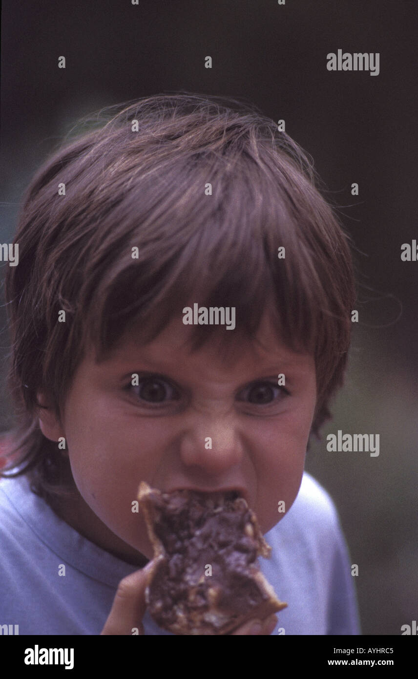 Kind beim Fruehstueck Stock Photo