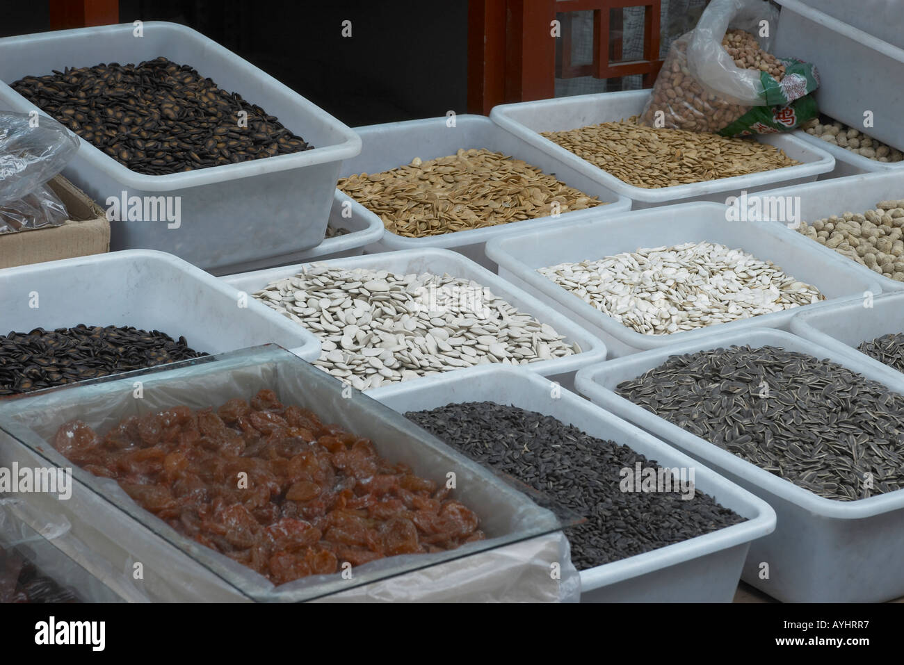 Shop selling loose dried fruit and pulses in Old Beijing China Stock Photo