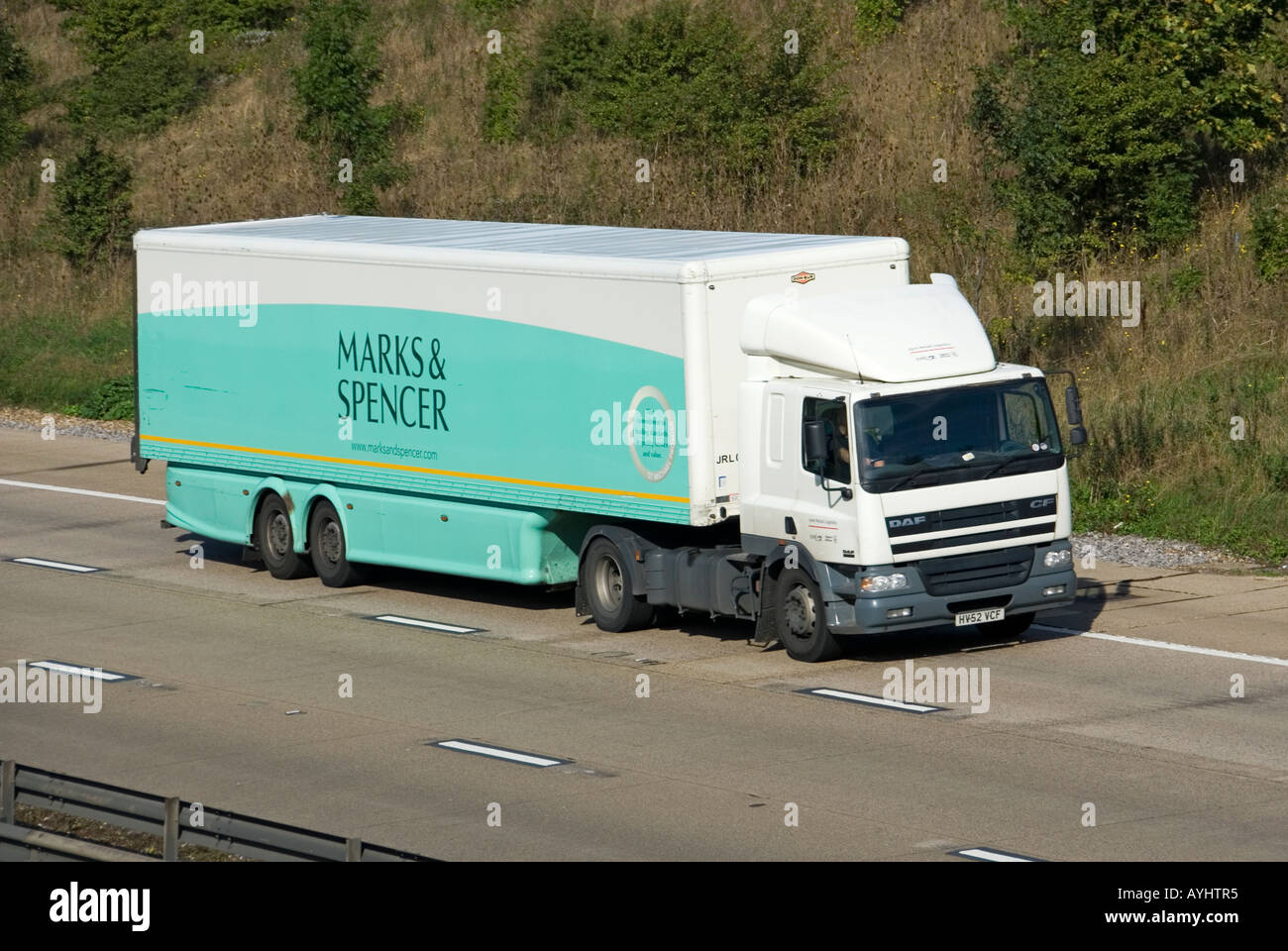 M25 motorway Marks and Spencer delivery trailer and lorry Stock Photo