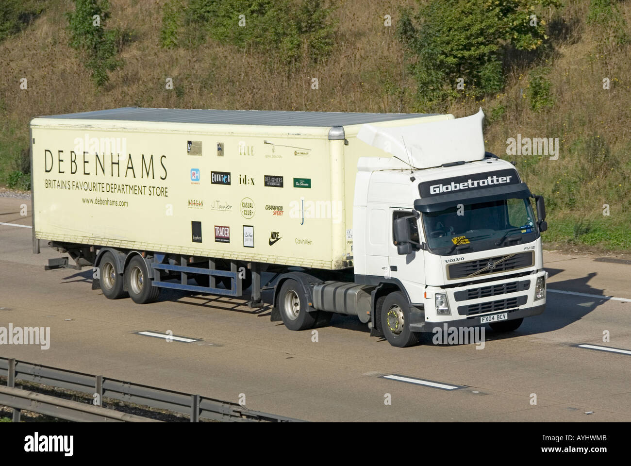 M25 motorway Debenhams department stores delivery trailer behind a