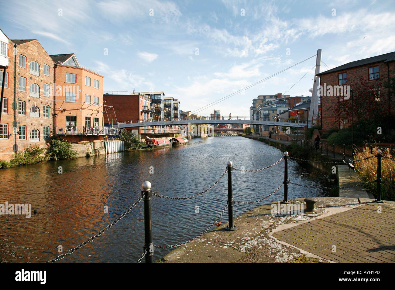 Leeds Waterfront on The River Aire, showing the bridge to the Oracle Stock Photo