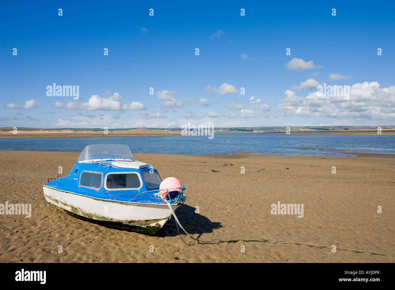 Boat stranded on the sands of Appledore at low tide Devon England Stock Photo