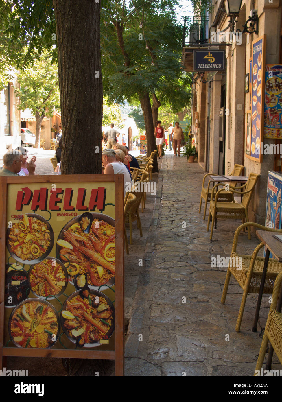 Street Cafe Paella Restaurant Tourists relaxing and eating Town of