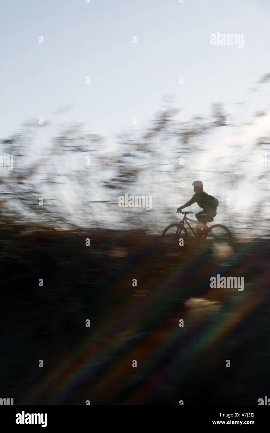 Someone Riding Fast Blurred figure of cyclist hi-res stock photography and images - Alamy