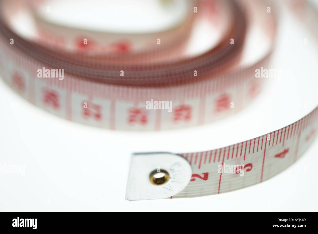 Tape measure on a white background Stock Photo - Alamy