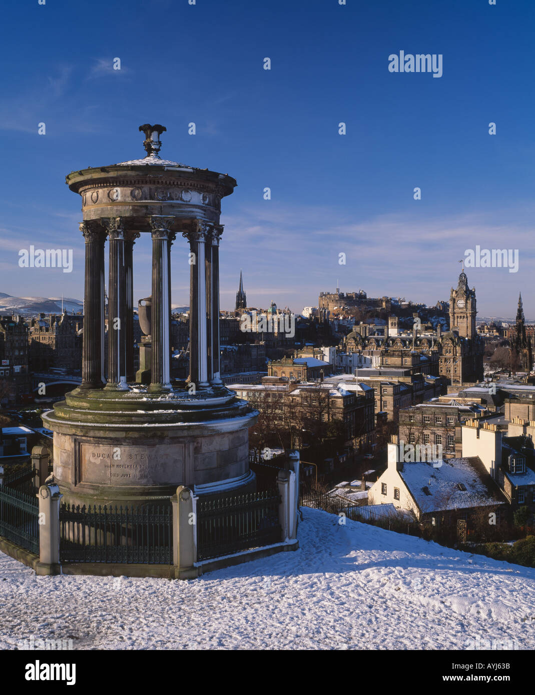 The Dugald Stuart Monument on Calton Hill, Edinburgh, Scotland, UK.   View of City skyline Stock Photo