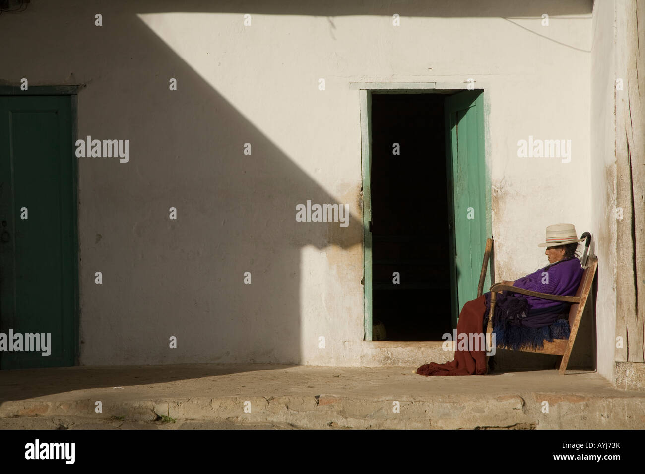 Old lady sitting in a chair hi-res stock photography and images - Alamy