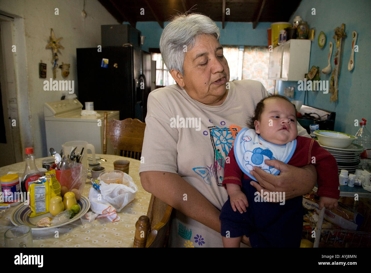 Nogales Sonora Mexico A grandmother holds a baby with a cleft palate Stock Photo