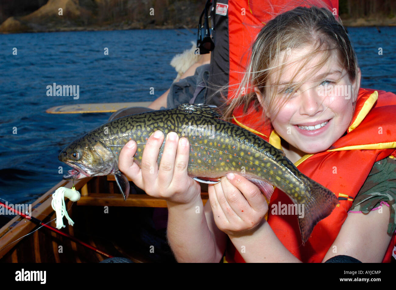 Girl holding brook trout hires stock photography and images Alamy