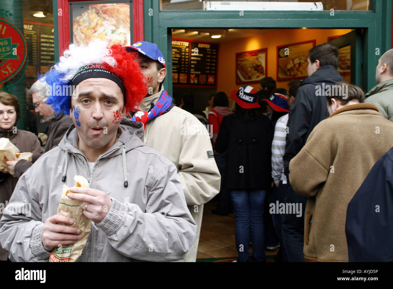 French rugby fan with baguette in the streets of Cardiff during the build up to Wales v France, 6 Nations, 2008 Stock Photo