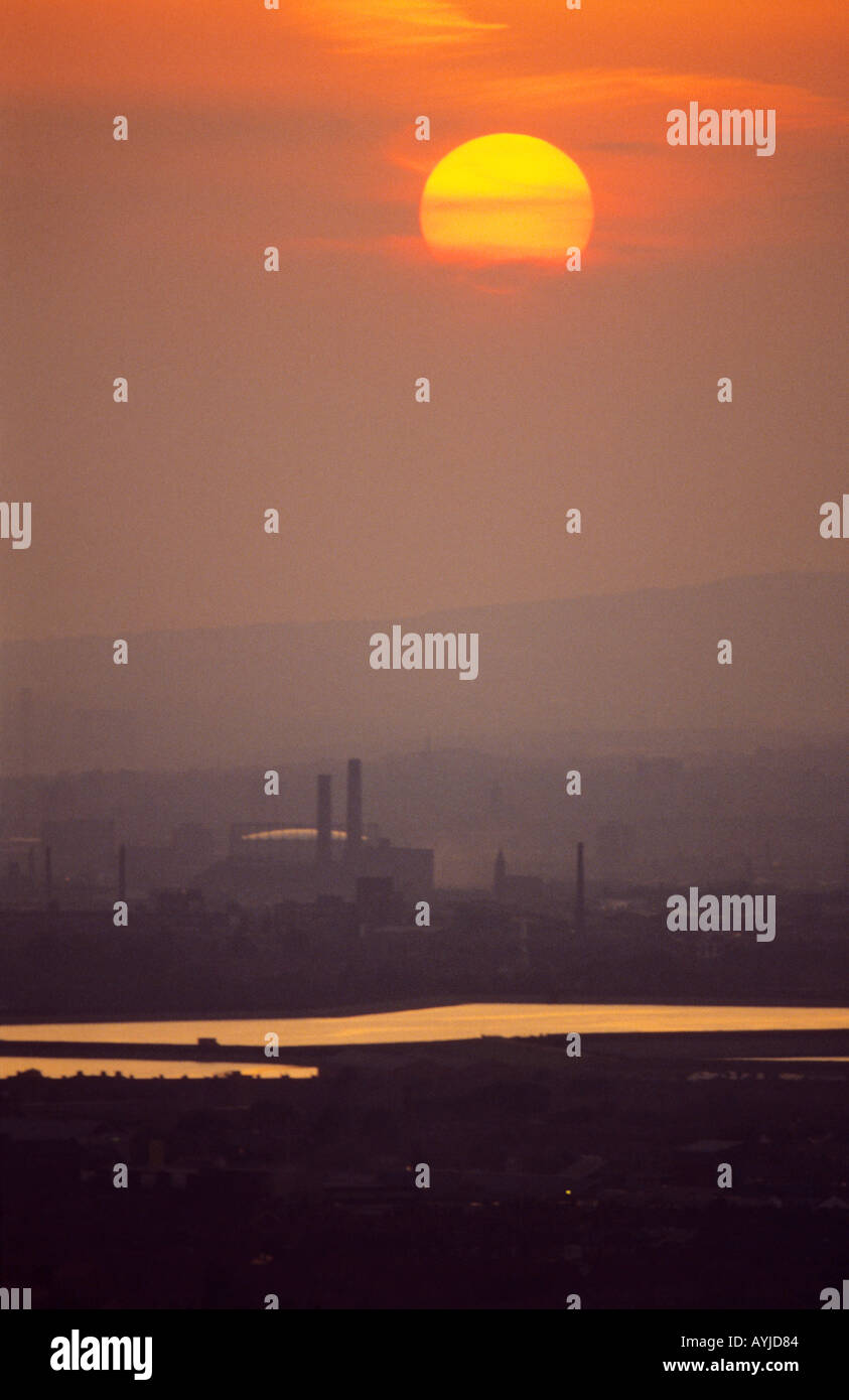 audenshaw reservoir Manchester UK view from Gee Cross City in distance with haze Stock Photo