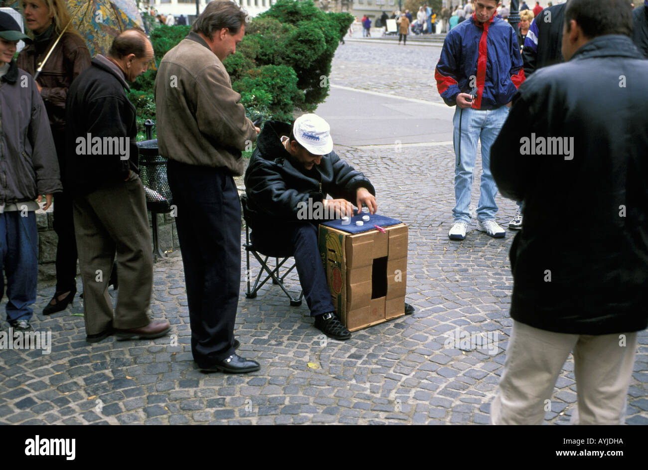 Budapest scam artists trying to involve passersby in illegal street games Stock Photo