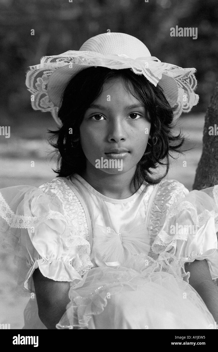 B/W portrait of a young girl in her Sunday best. Bangladesh Stock Photo