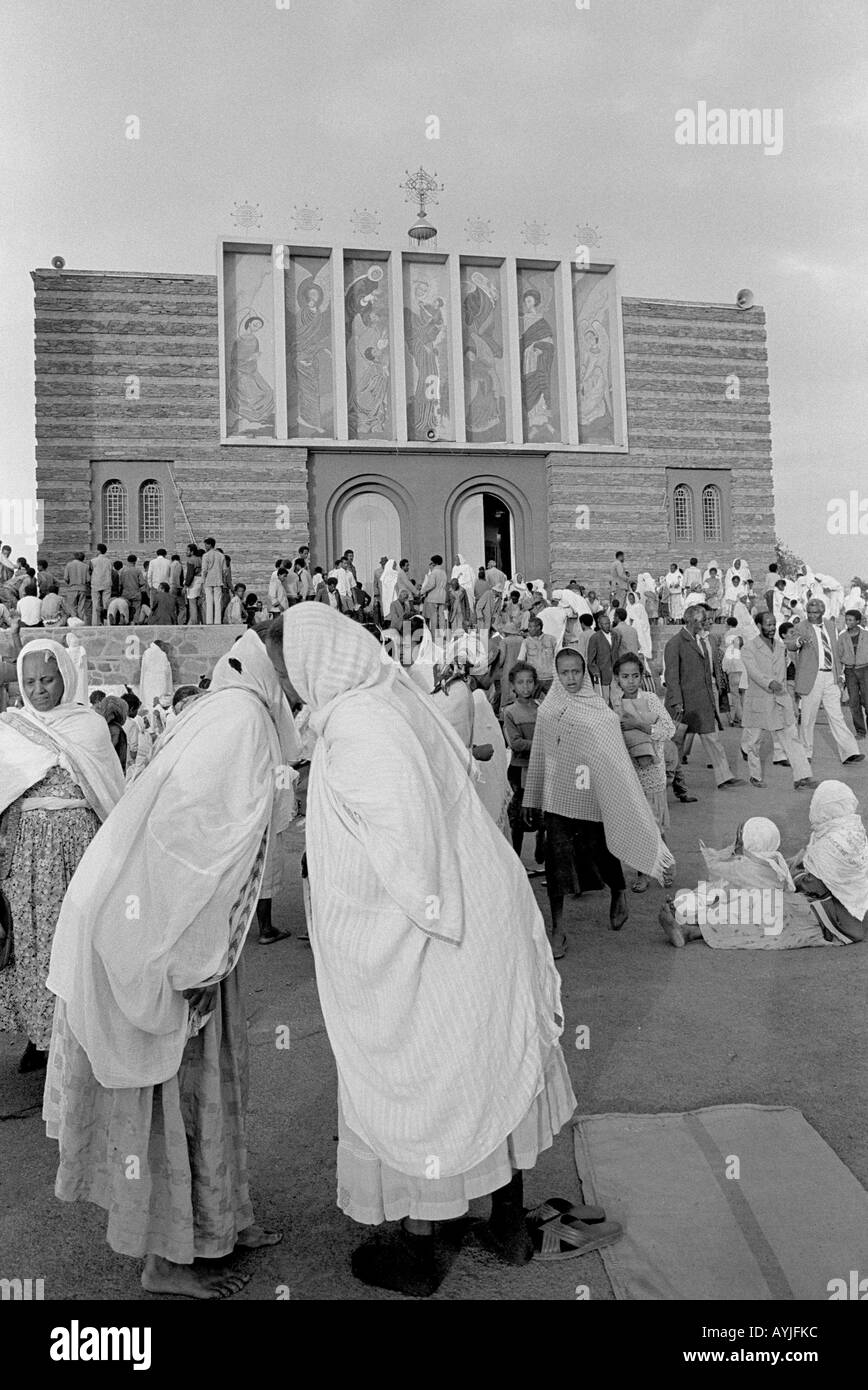 B/W of the congregation gathering outside Enda Mariam Cathedral after the Easter service. Asmara, Eritrea Stock Photo