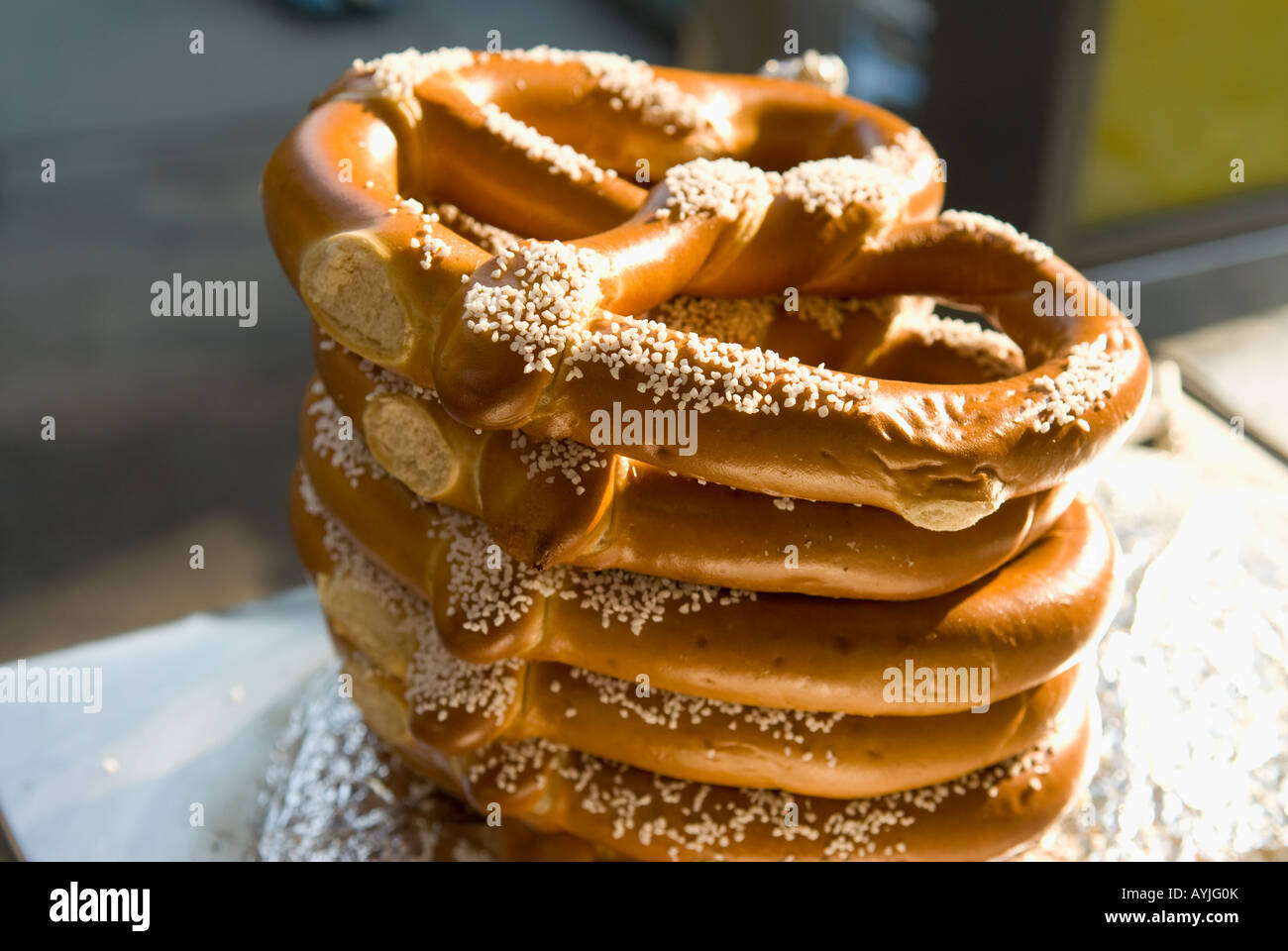 stack of salted pretzels on street vendor's cart Stock Photo