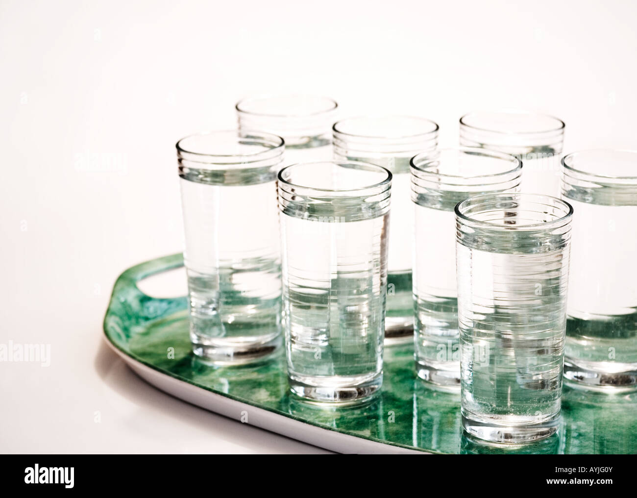 eight glasses of water Stock Photo