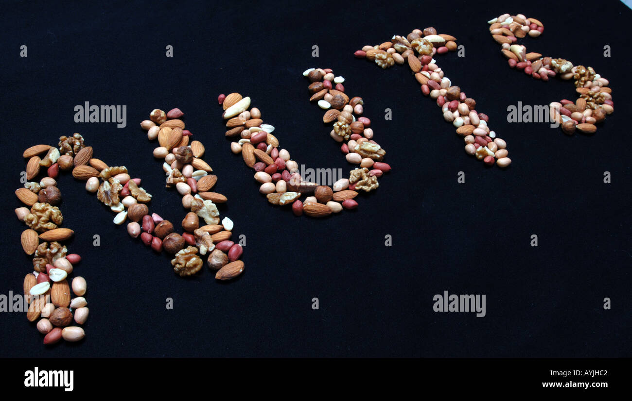 Mixed nuts spelling out the word nuts Stock Photo Alamy