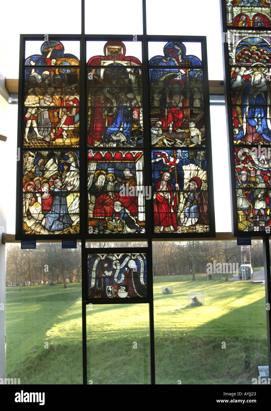 Stained glass panels hanging in the Burrell collection Glasgow Scotland