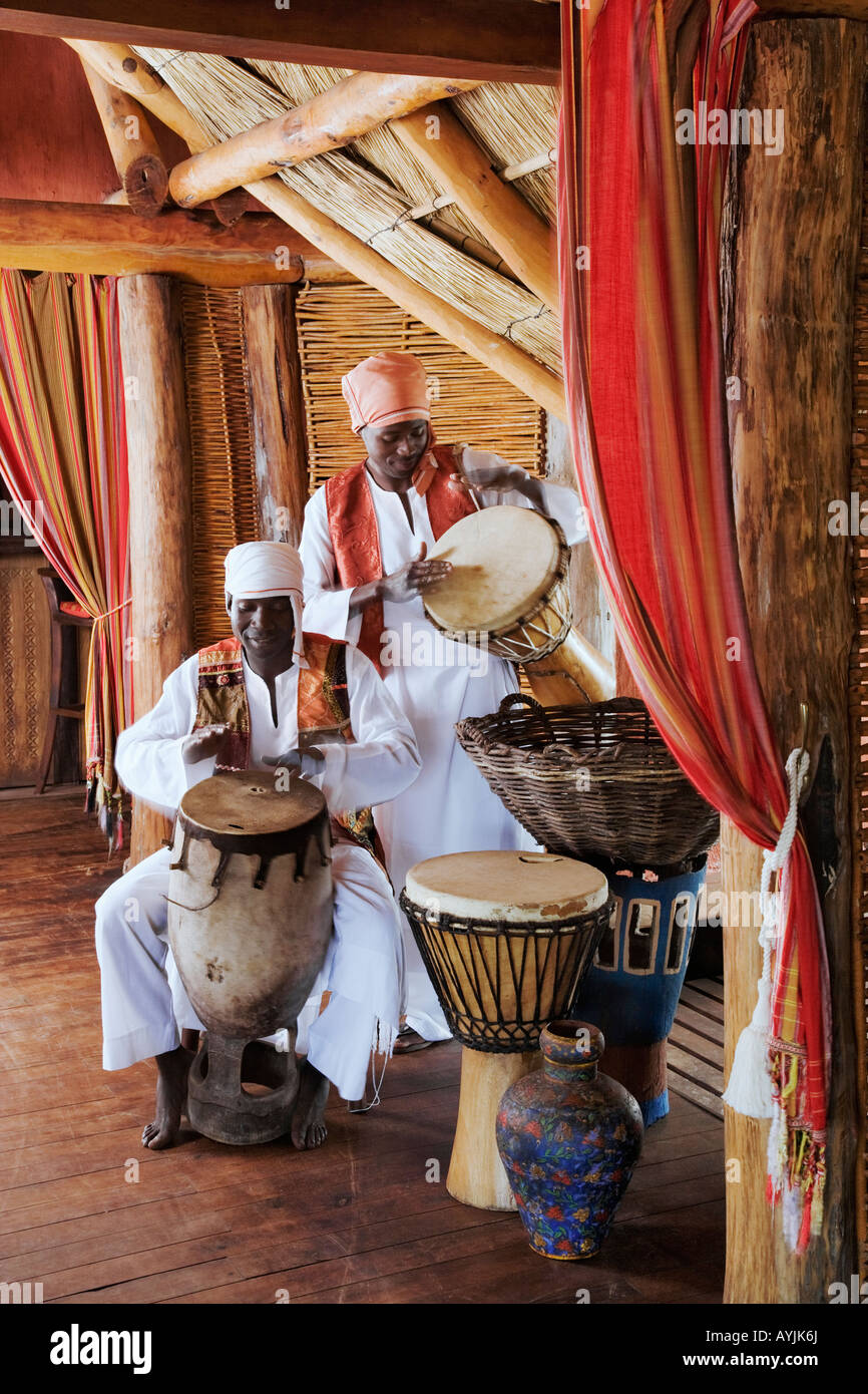 Midday drumming entertainment in the dining room of the exclusive luxury accommodation at Benguerra Lodge Mozambique Stock Photo